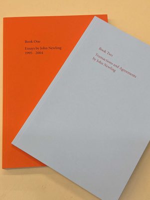 Two books by John Newling, one with a white cover, the other with an orange cover.